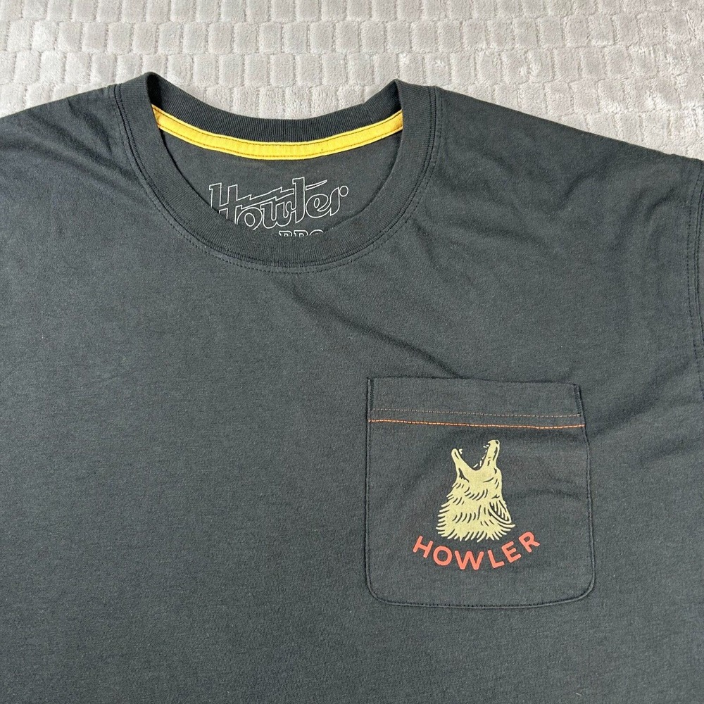 Howler Brothers Black Short Sleeve Pocket Tee with Yellow & Orange Logo